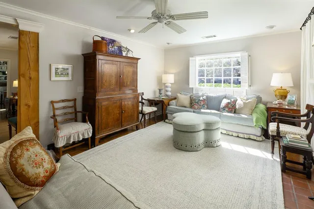 a living room with furniture and a window