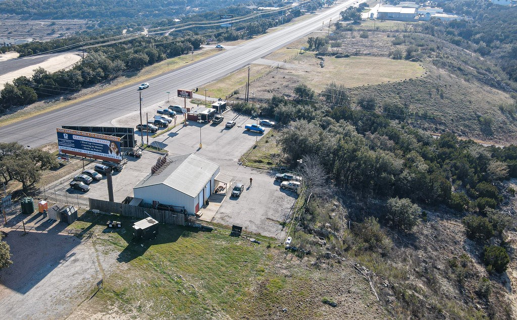 21601 State Highway 71 Spicewood, TX 78669 - Photo 3 of 32 EXTENSIVE HIGHWAY FRONTAGE & HIGH VISIBILITY ON THIS MAIN TEXAS HIGHWAY