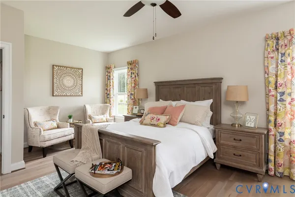 a bedroom with a bed and a couch
