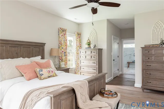 a bedroom with a bed and a dresser