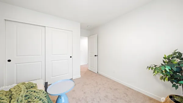 a view of a livingroom with furniture and wooden floor