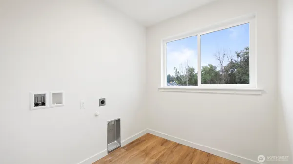 a view of a room that has a window in it