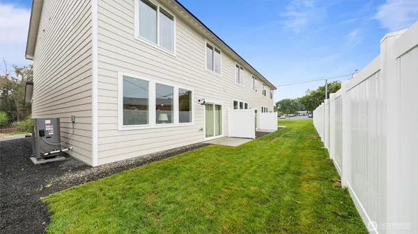 a view of a back yard of the house