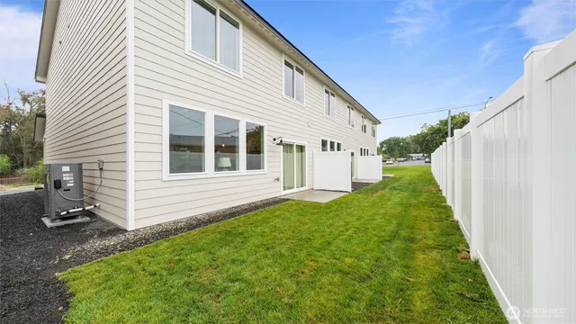 a view of a back yard of the house