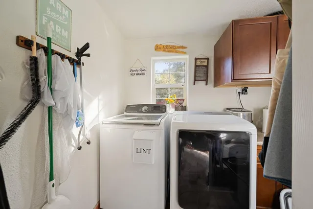 a view of a street with houses on both side