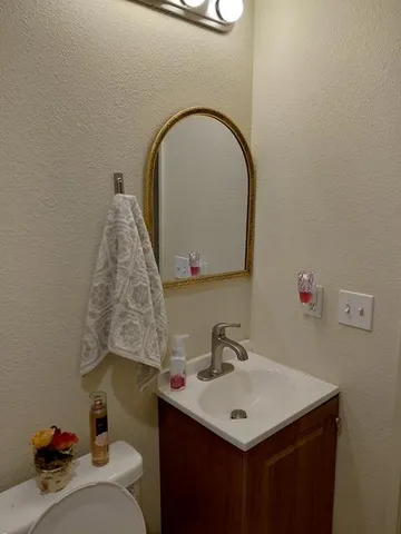 a view of a house with a yard porch and sitting area