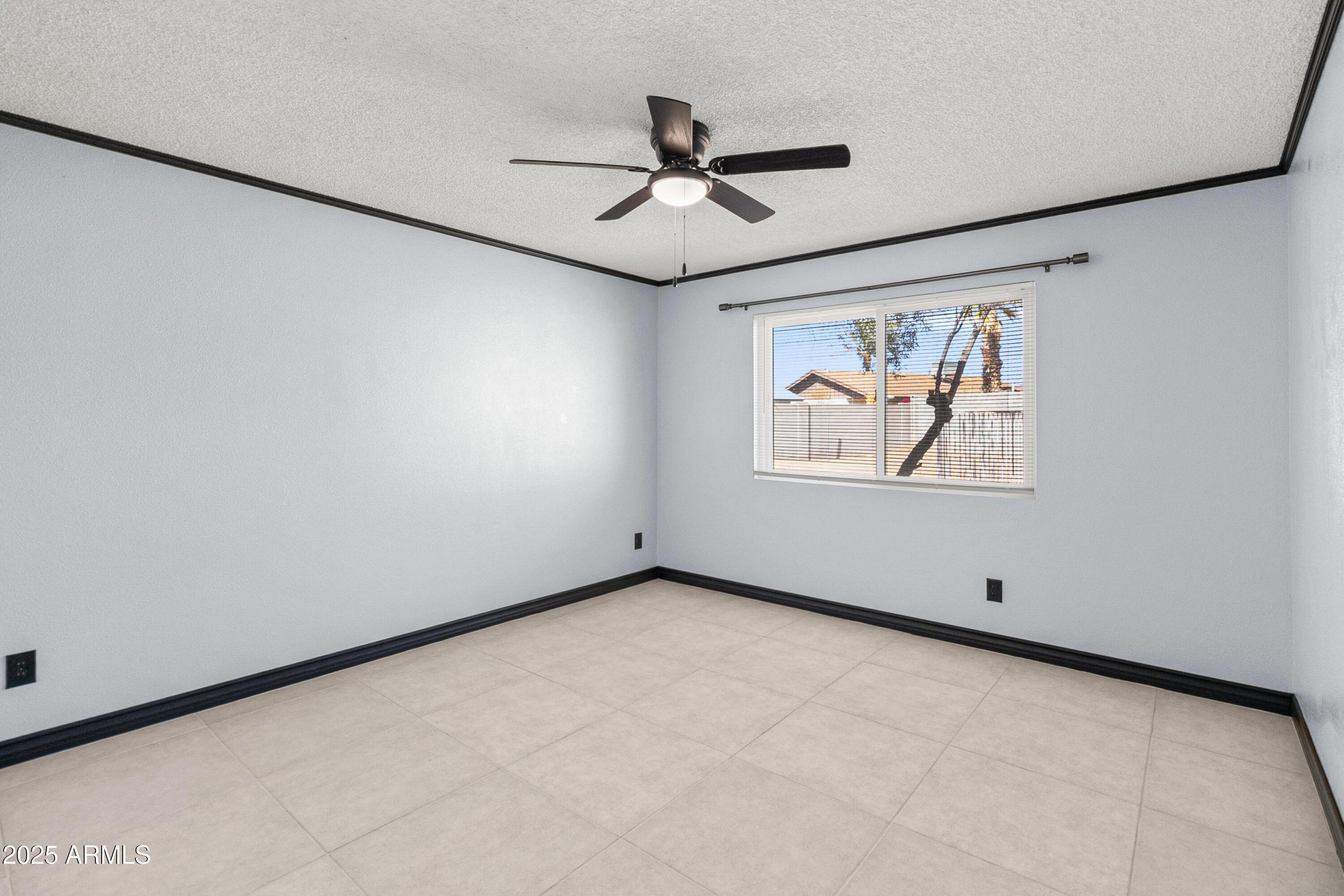 2846 West Villa Rita Drive Phoenix, AZ 85053 - Photo 19 of 24 a view of empty room with wooden floor
