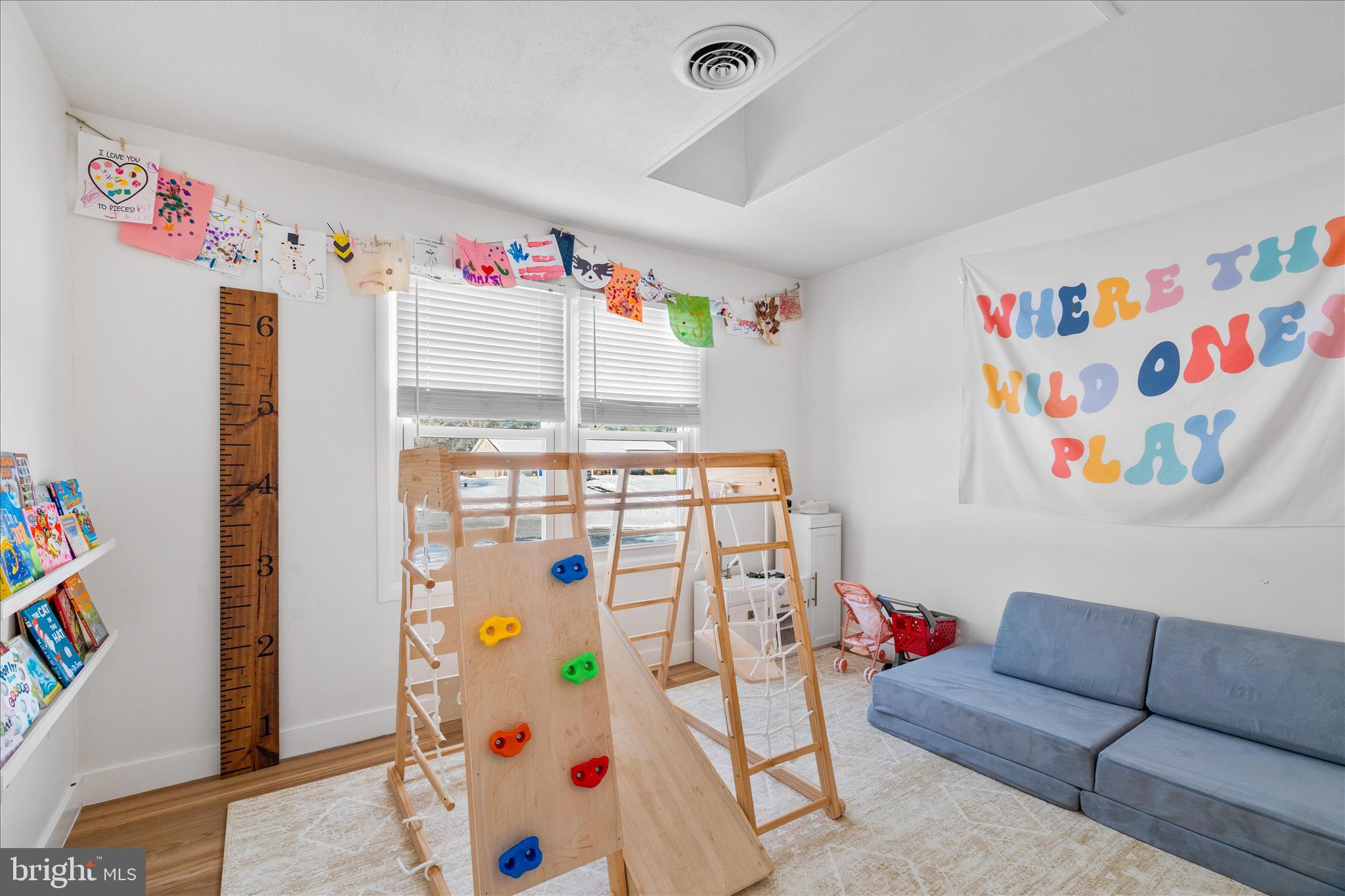 7997 Pleasant Court Frederick, MD 21701 - Photo 11 of 78 a utility room with fridge and a couch