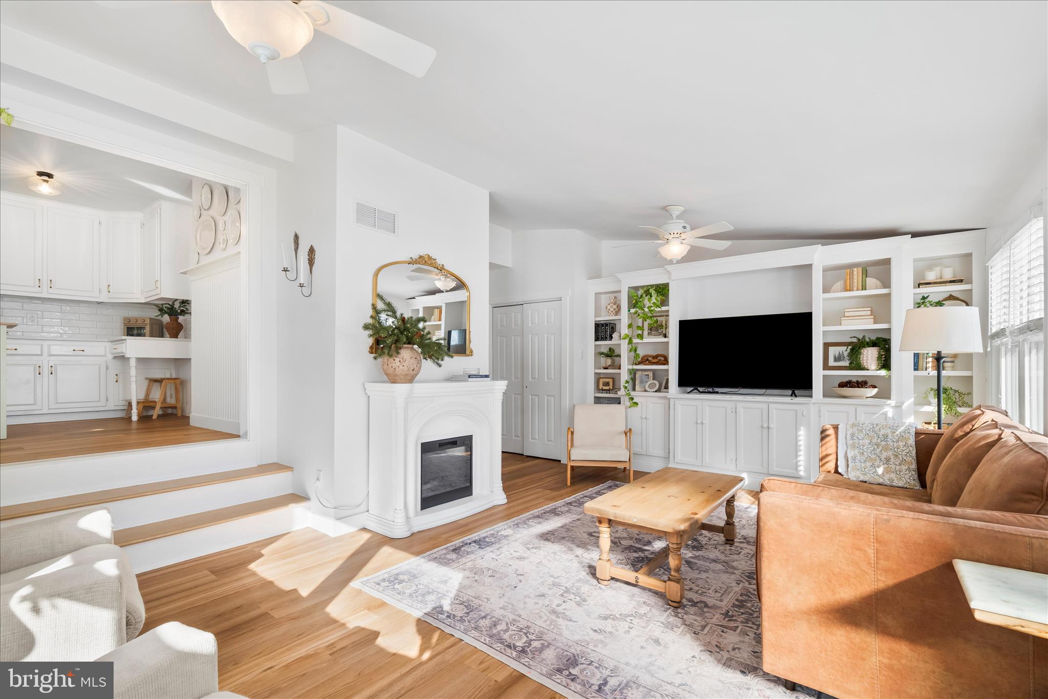 7997 Pleasant Court Frederick, MD 21701 - Photo 24 of 78 a living room with furniture and a flat screen tv