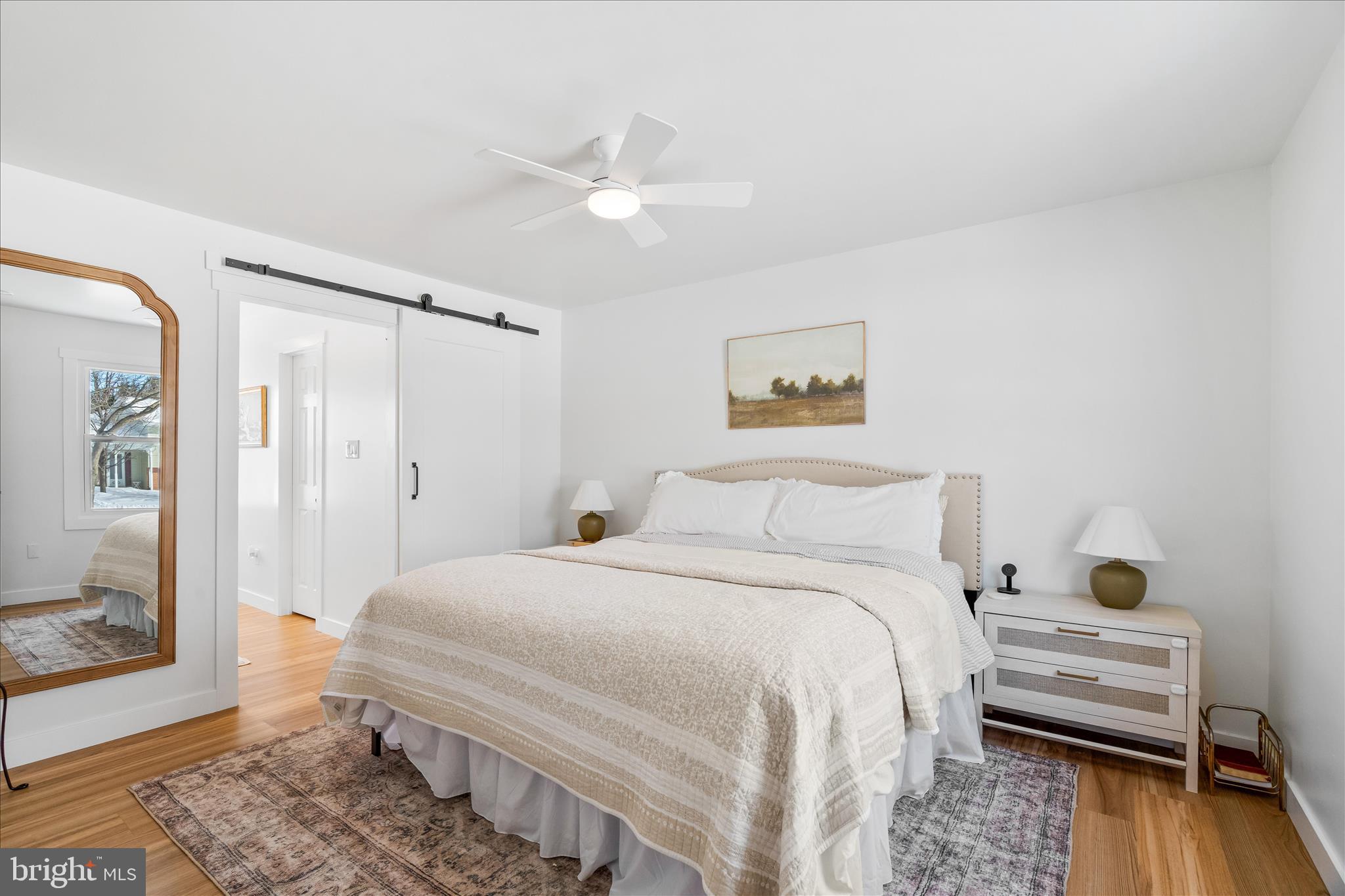 7997 Pleasant Court Frederick, MD 21701 - Photo 28 of 78 a bedroom with a bed and wooden floor
