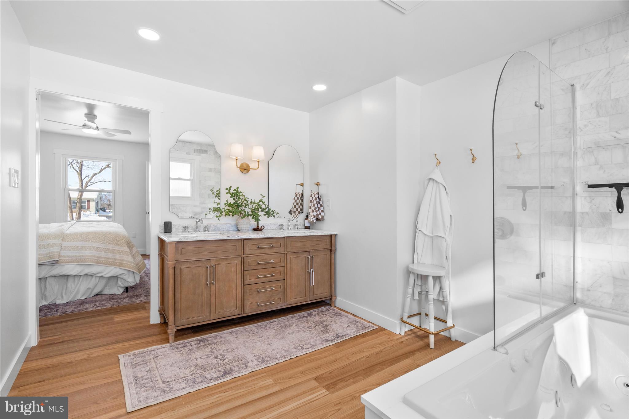 7997 Pleasant Court Frederick, MD 21701 - Photo 32 of 78 a view of a double vanity sink and mirror