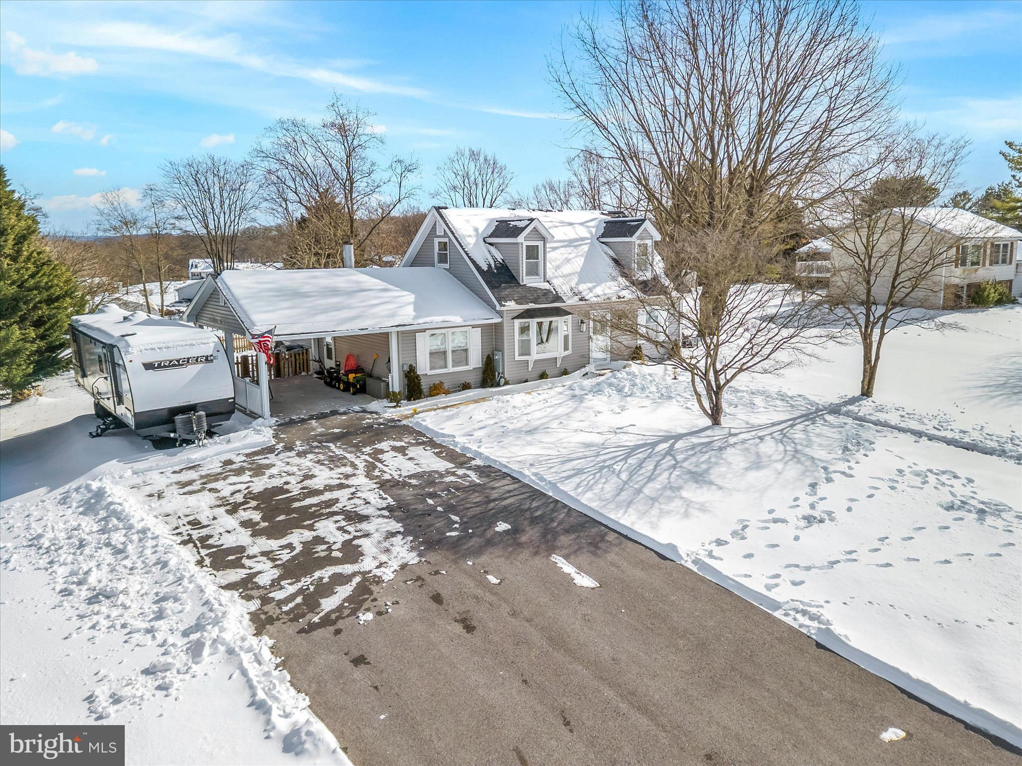 7997 Pleasant Court Frederick, MD 21701 - Photo 58 of 78 a view of a house with a yard covered in snow