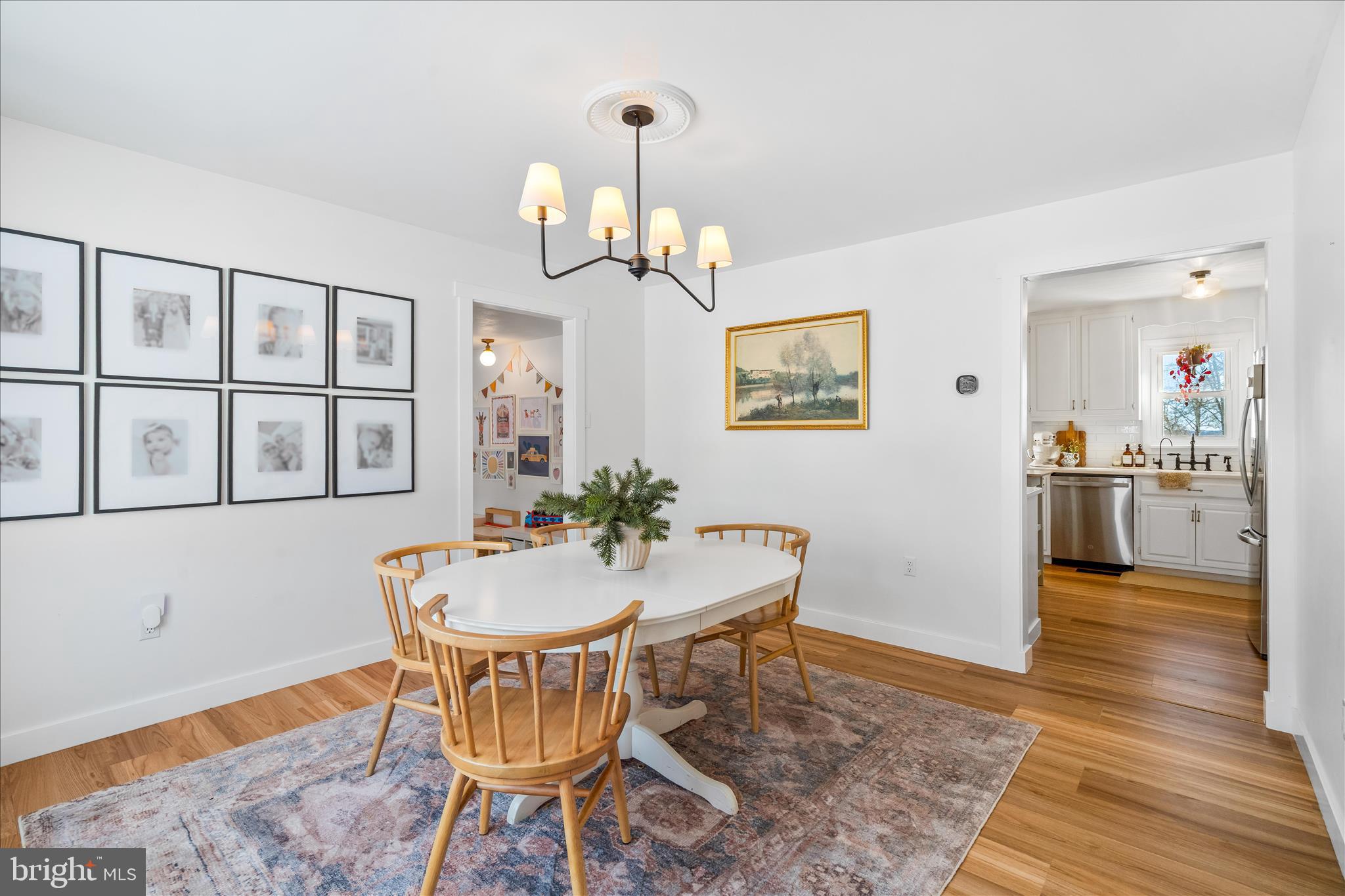 7997 Pleasant Court Frederick, MD 21701 - Photo 8 of 78 a view of a dining room with furniture and wooden floor