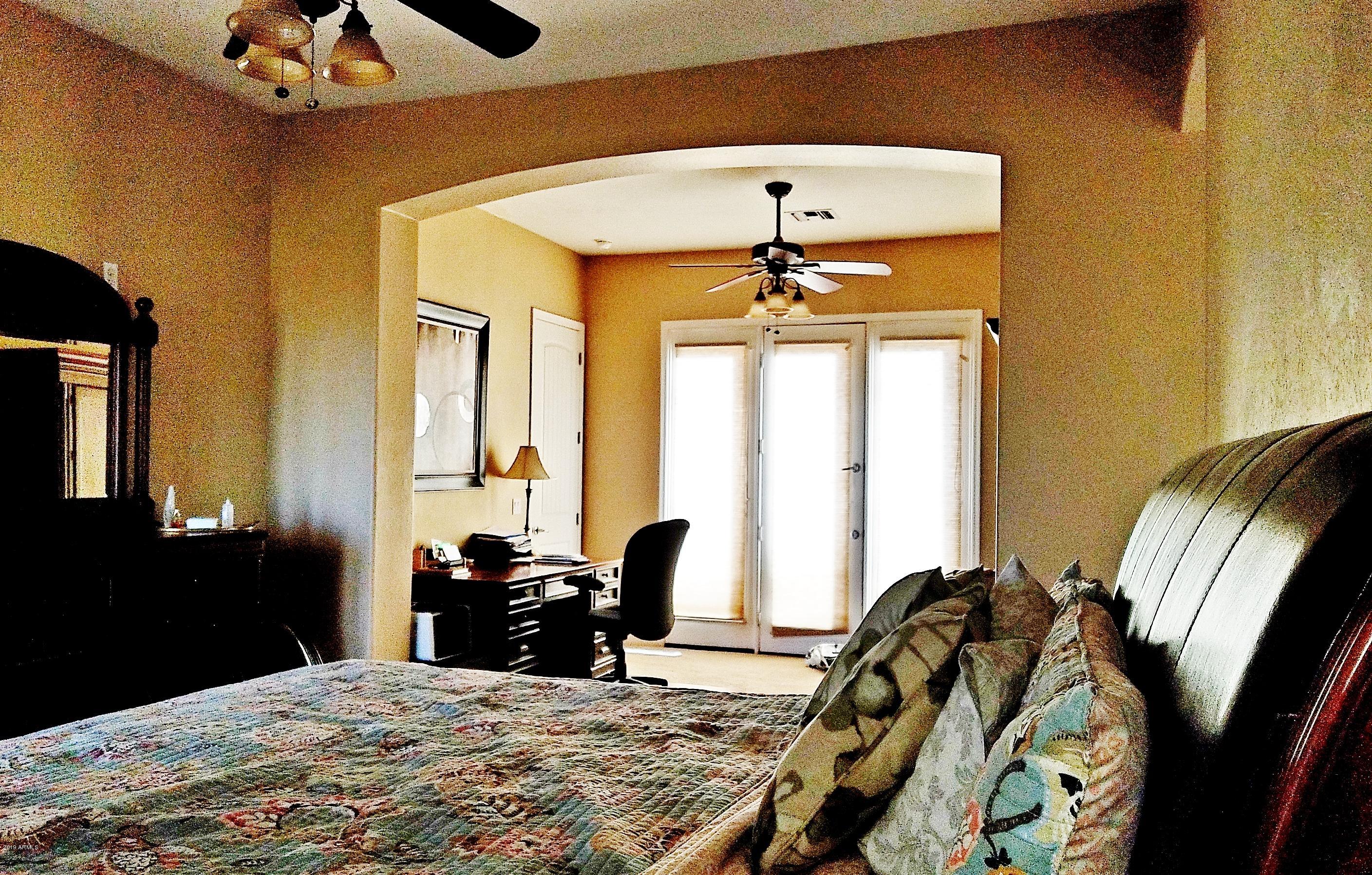 17424 West Ocotillo Road Waddell, AZ 85355 - Photo 15 of 38 Master bedroom