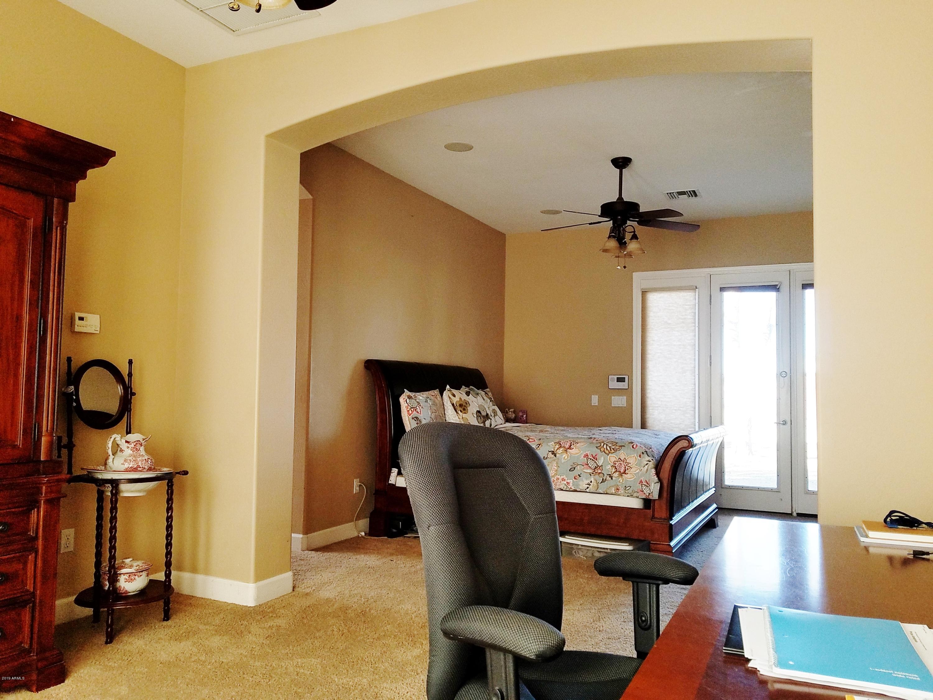 17424 West Ocotillo Road Waddell, AZ 85355 - Photo 16 of 38 Master bedroom sitting area