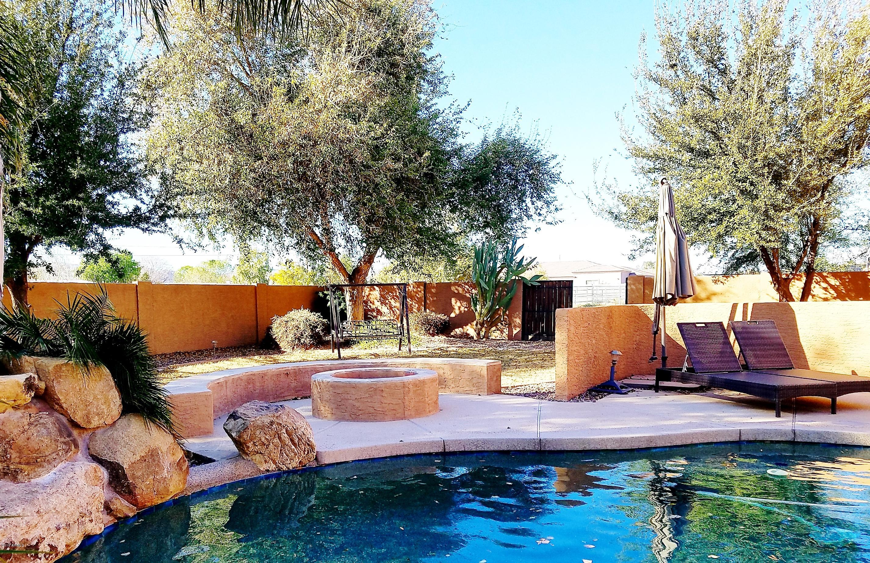 17424 West Ocotillo Road Waddell, AZ 85355 - Photo 19 of 38 Pool firepit
