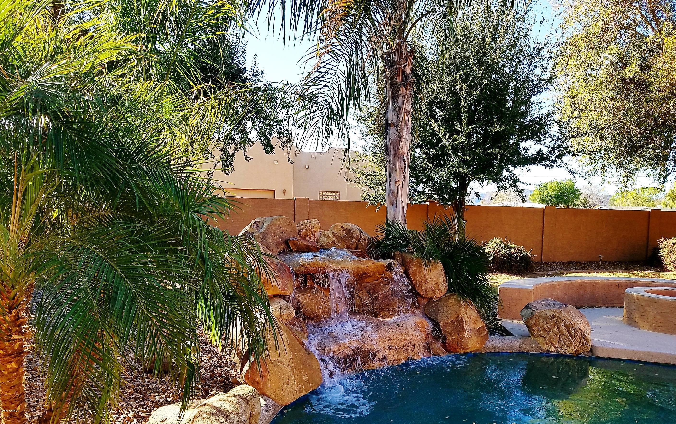 17424 West Ocotillo Road Waddell, AZ 85355 - Photo 24 of 38 Pool Waterfall