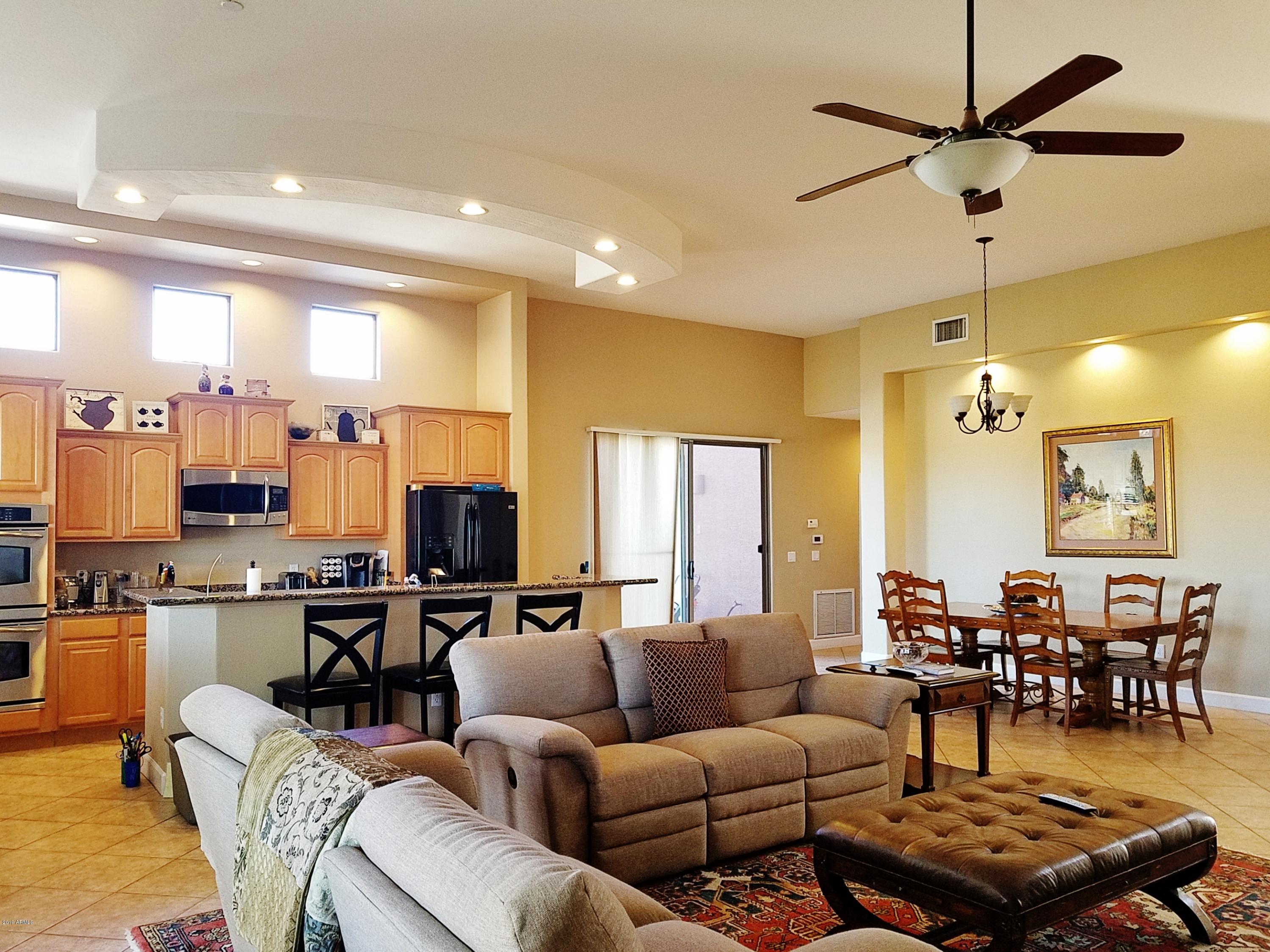 17424 West Ocotillo Road Waddell, AZ 85355 - Photo 3 of 38 Greatroom looking at dining