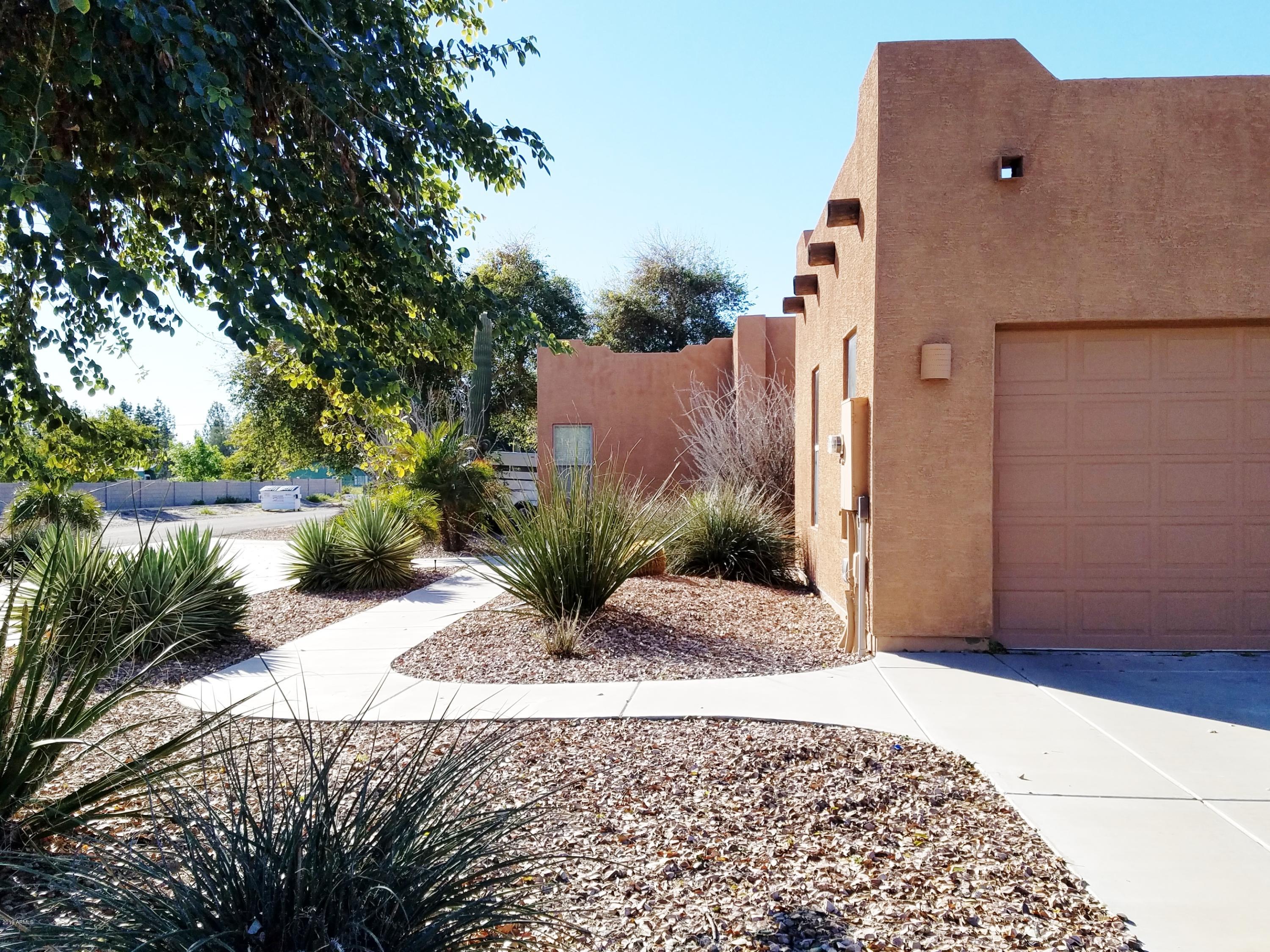 17424 West Ocotillo Road Waddell, AZ 85355 - Photo 4 of 38 Garage and side