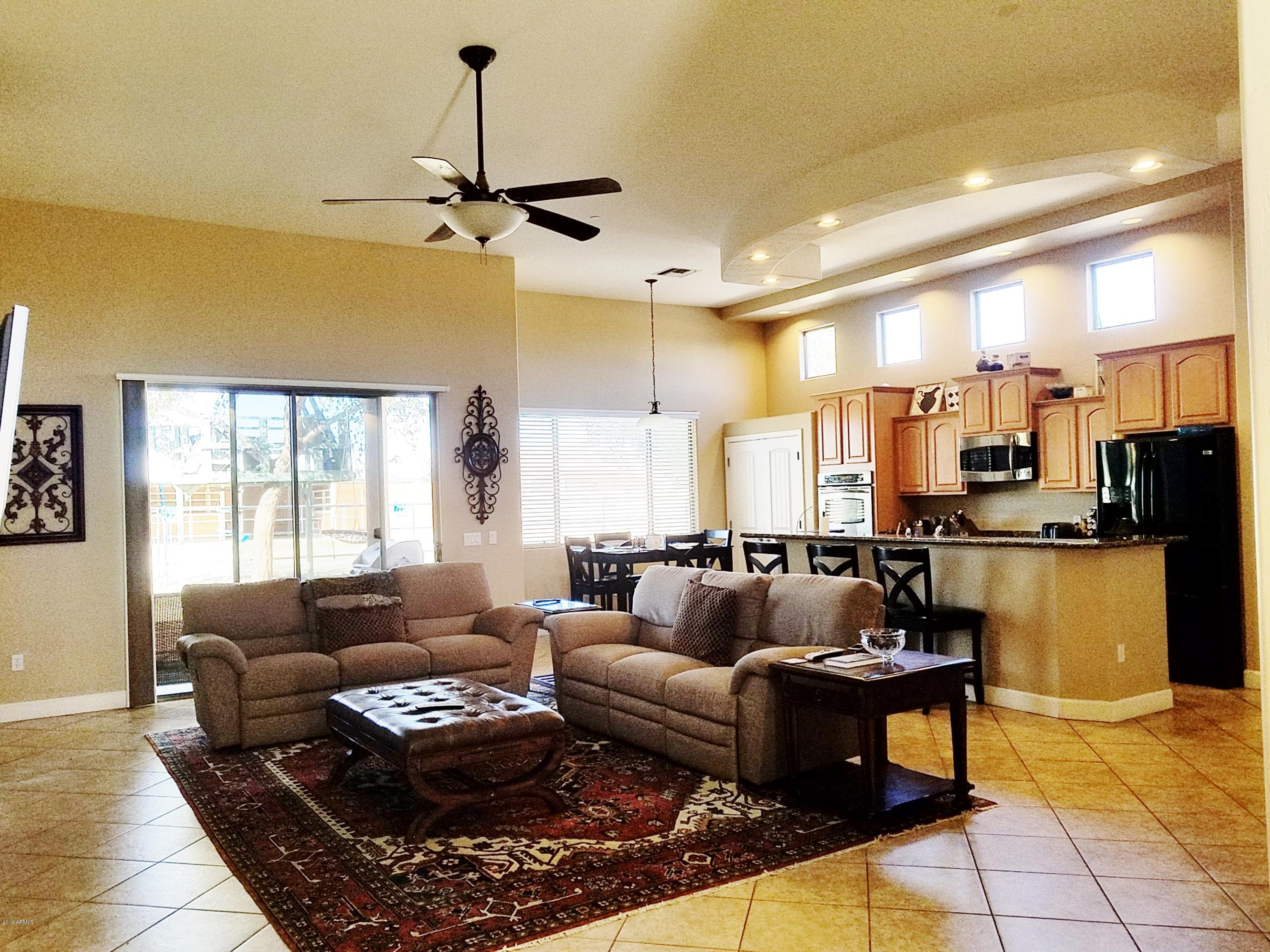 17424 West Ocotillo Road Waddell, AZ 85355 - Photo 6 of 38 Greatroom looking at kitchen