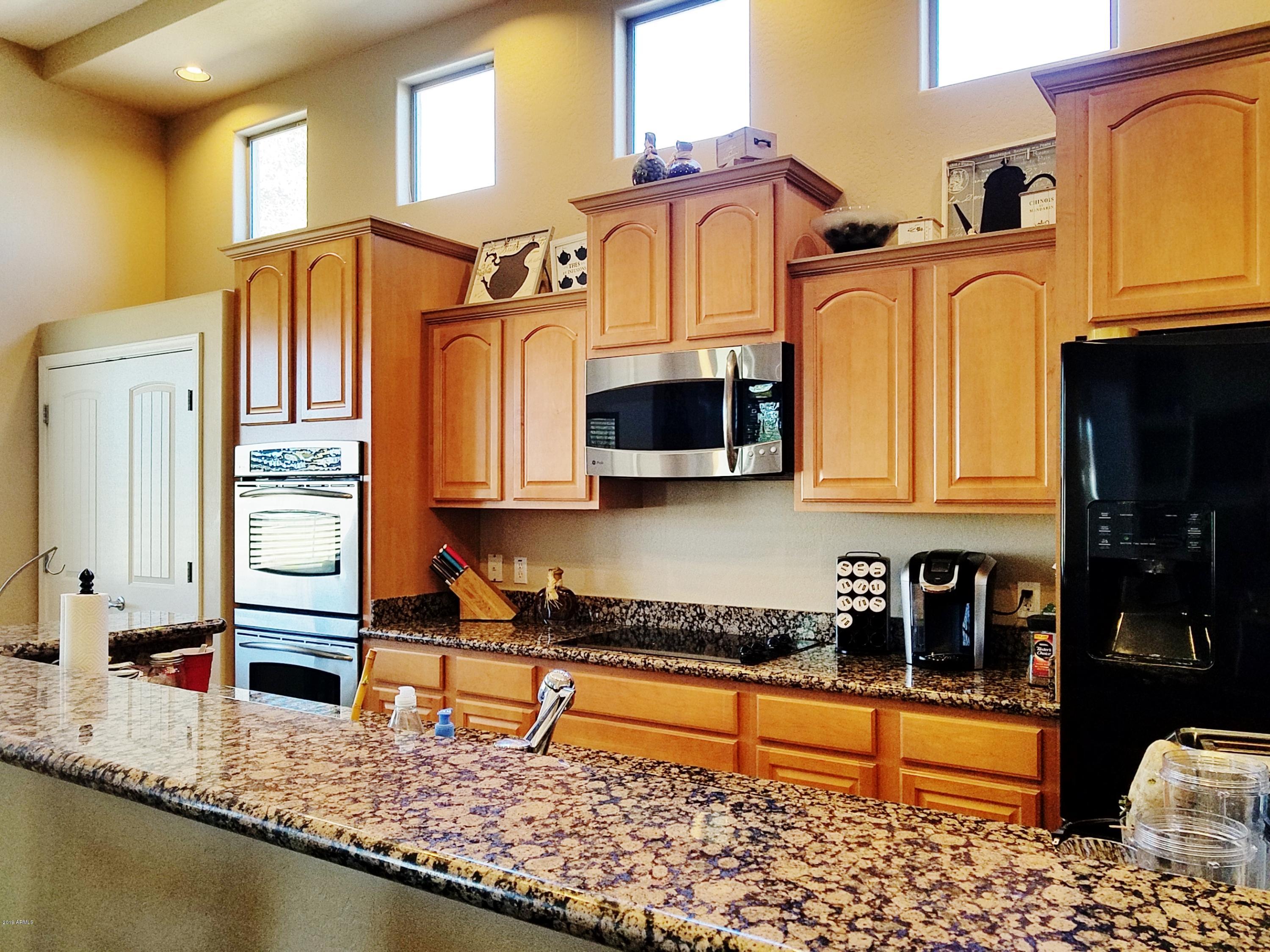 17424 West Ocotillo Road Waddell, AZ 85355 - Photo 7 of 38 Kitchen stove area