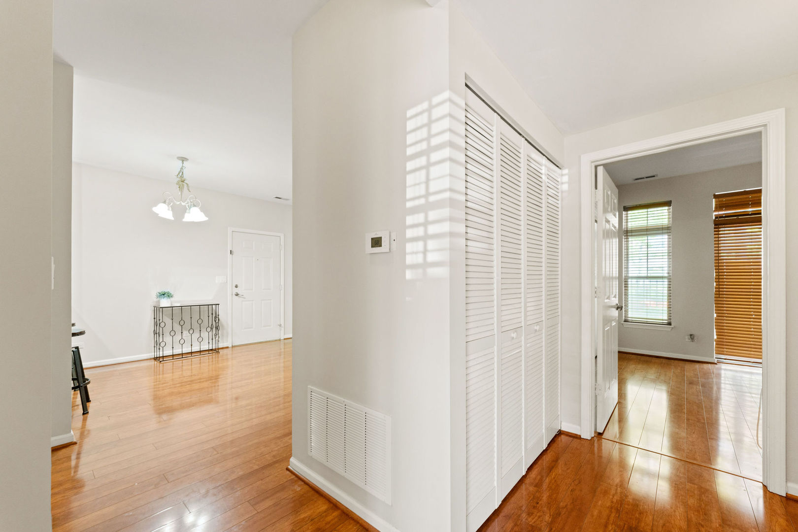1406 South Halsted Street, Unit 1A Chicago, IL 60607 - Photo 14 of 25 a view of a hallway with wooden floor and staircase