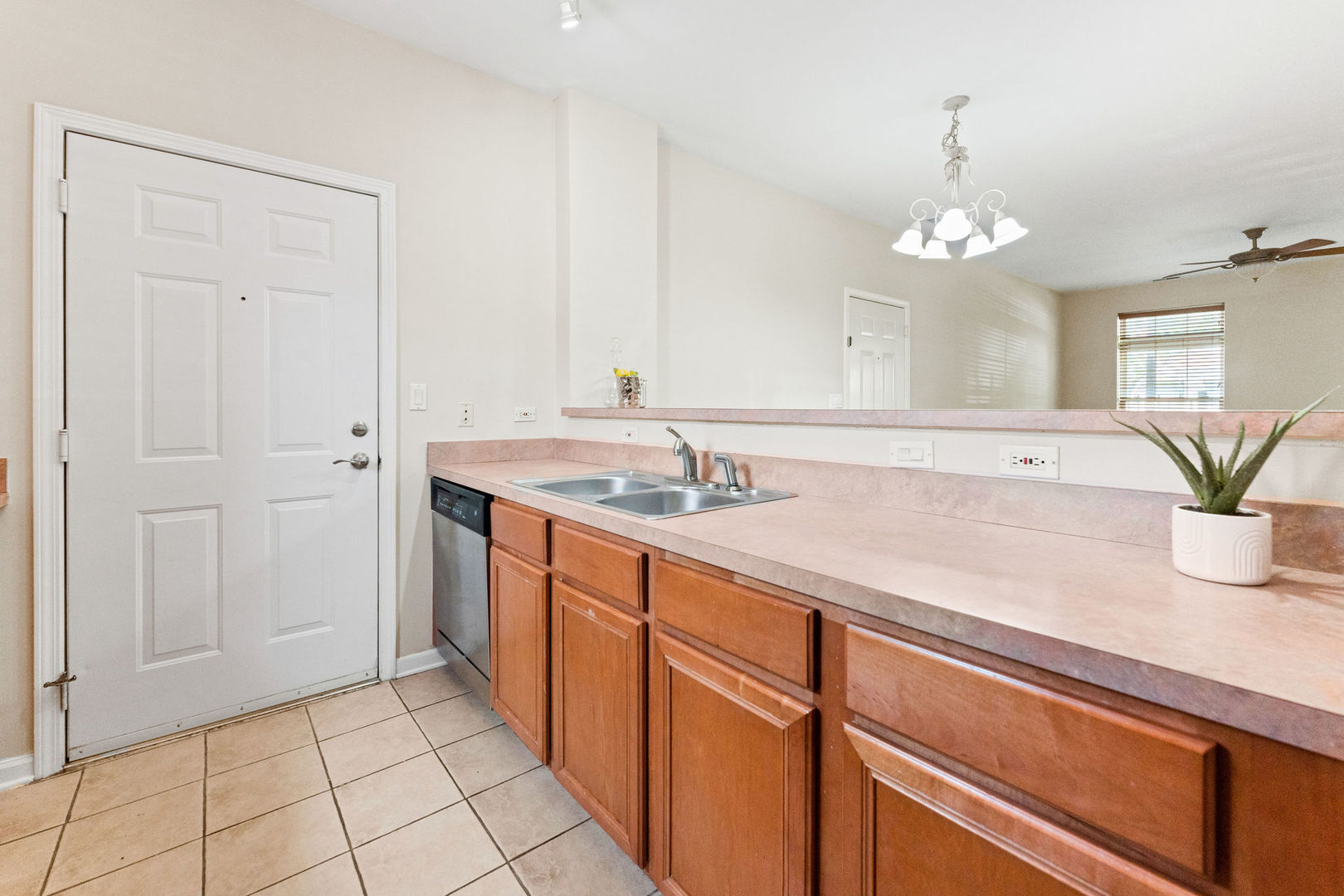 1406 South Halsted Street, Unit 1A Chicago, IL 60607 - Photo 6 of 25 a spacious bathroom with a granite countertop sink a mirror and a shower
