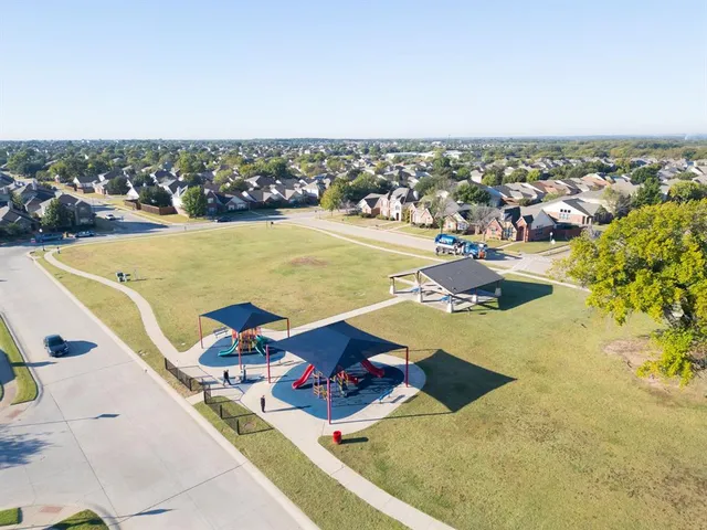 a view of a swimming pool with an ocean view