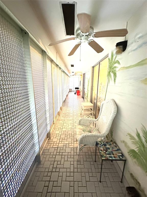 57 Markham C, Unit 57 Deerfield Beach, FL 33442 - Photo 31 of 76 a view of a dining room with furniture and chandelier