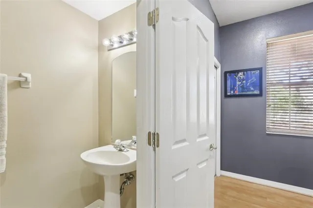 a bedroom with a bed and dresser