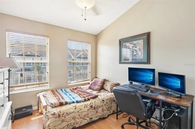 a view of a porch with furniture and garden