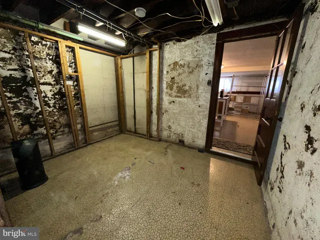 a view of a swimming pool with a patio and a yard