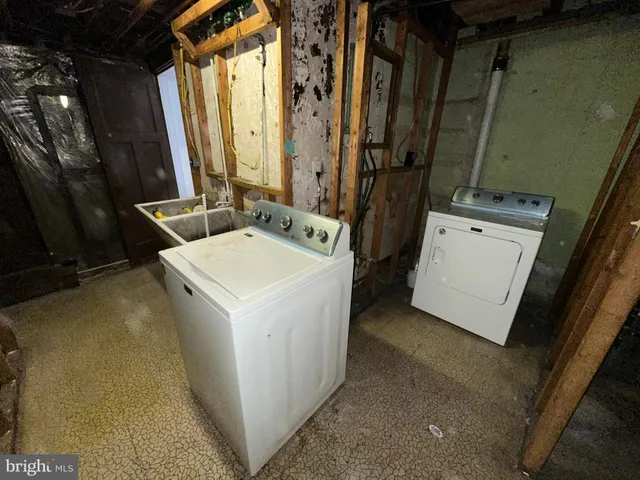 a bathroom with a sink a toilet and a bathtub