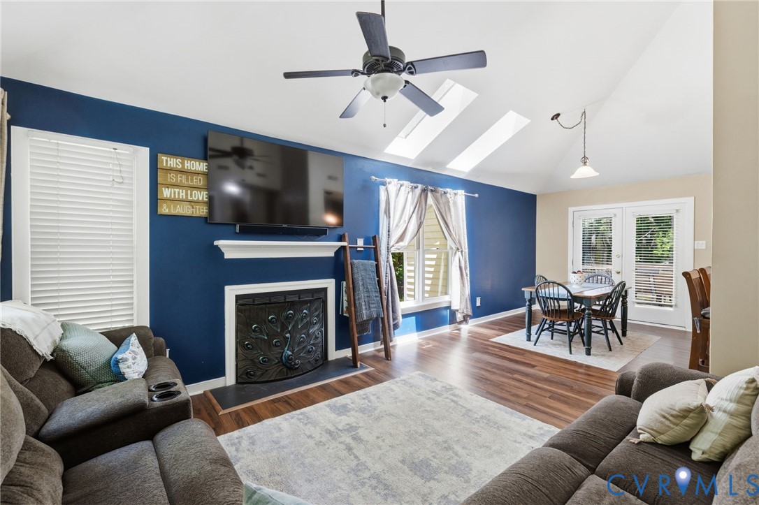 5613 Woods Walk Road Midlothian, VA 23112 - Photo 3 of 28 Open living room with vaulted ceilings and a ceili