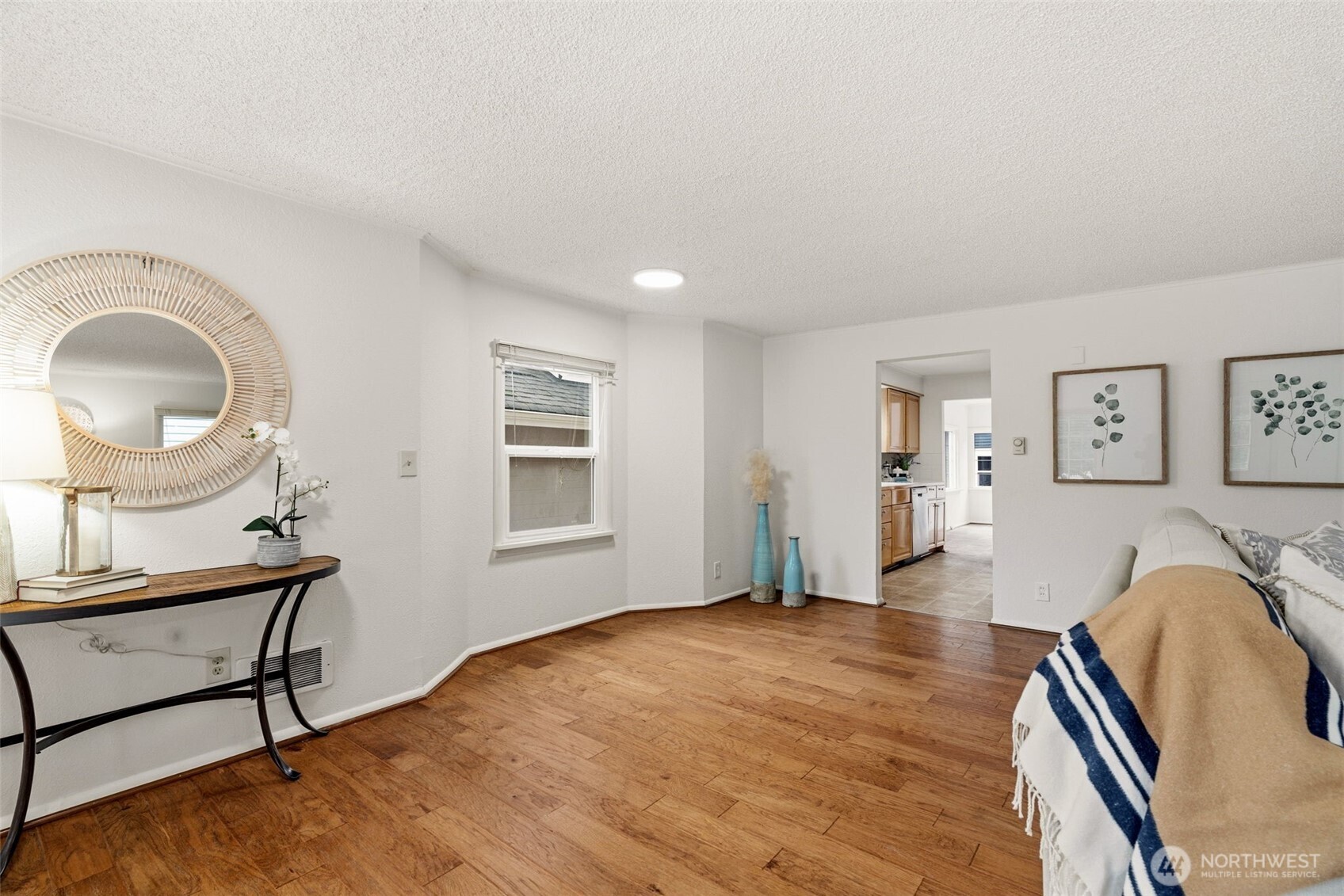 921 North 50th Street Seattle, WA 98103 - Photo 11 of 32 a view of a livingroom with furniture and hardwood floor