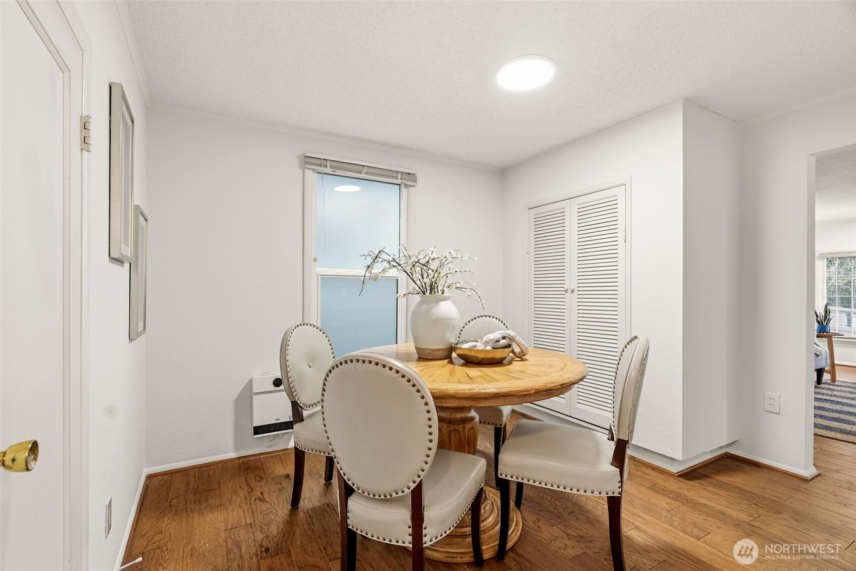 921 North 50th Street Seattle, WA 98103 - Photo 12 of 32 a dining room with furniture and window