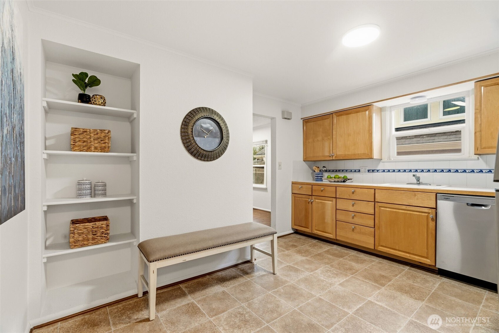 921 North 50th Street Seattle, WA 98103 - Photo 16 of 32 a spacious bedroom with a bed and a cabinets