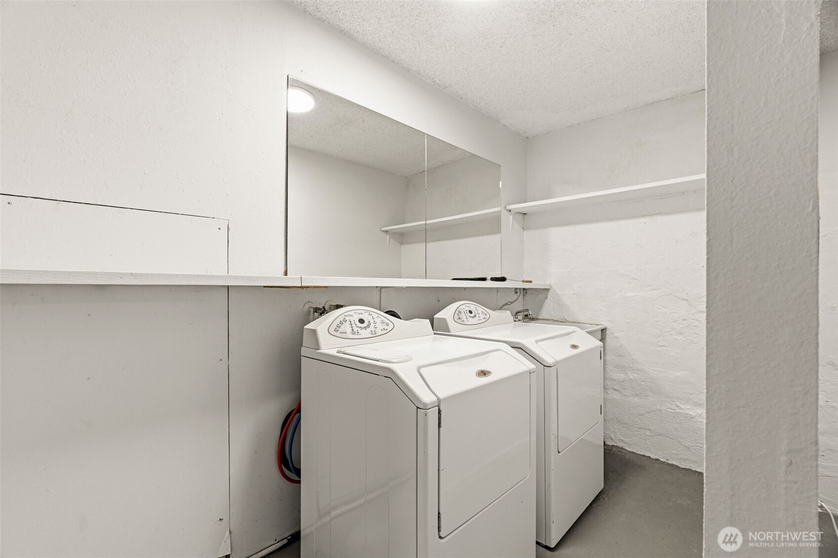 921 North 50th Street Seattle, WA 98103 - Photo 27 of 32 a utility room with dryer and washer
