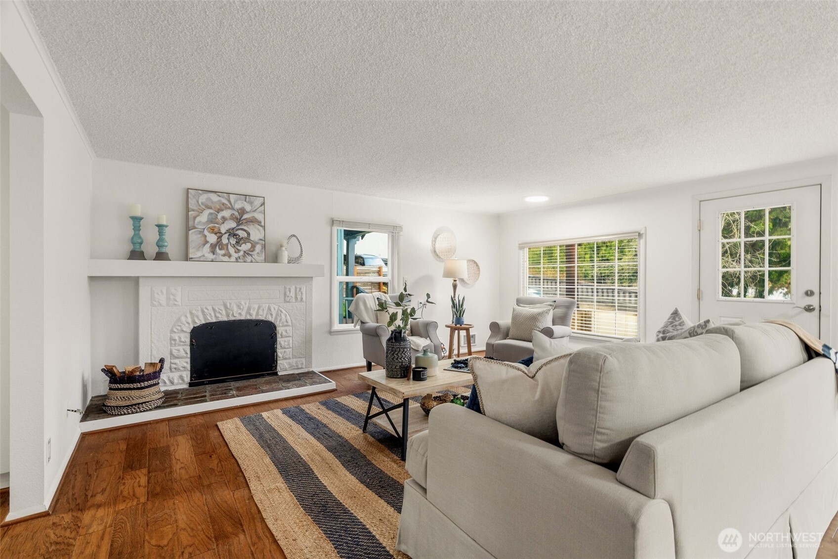 921 North 50th Street Seattle, WA 98103 - Photo 5 of 32 a living room with furniture and a fireplace