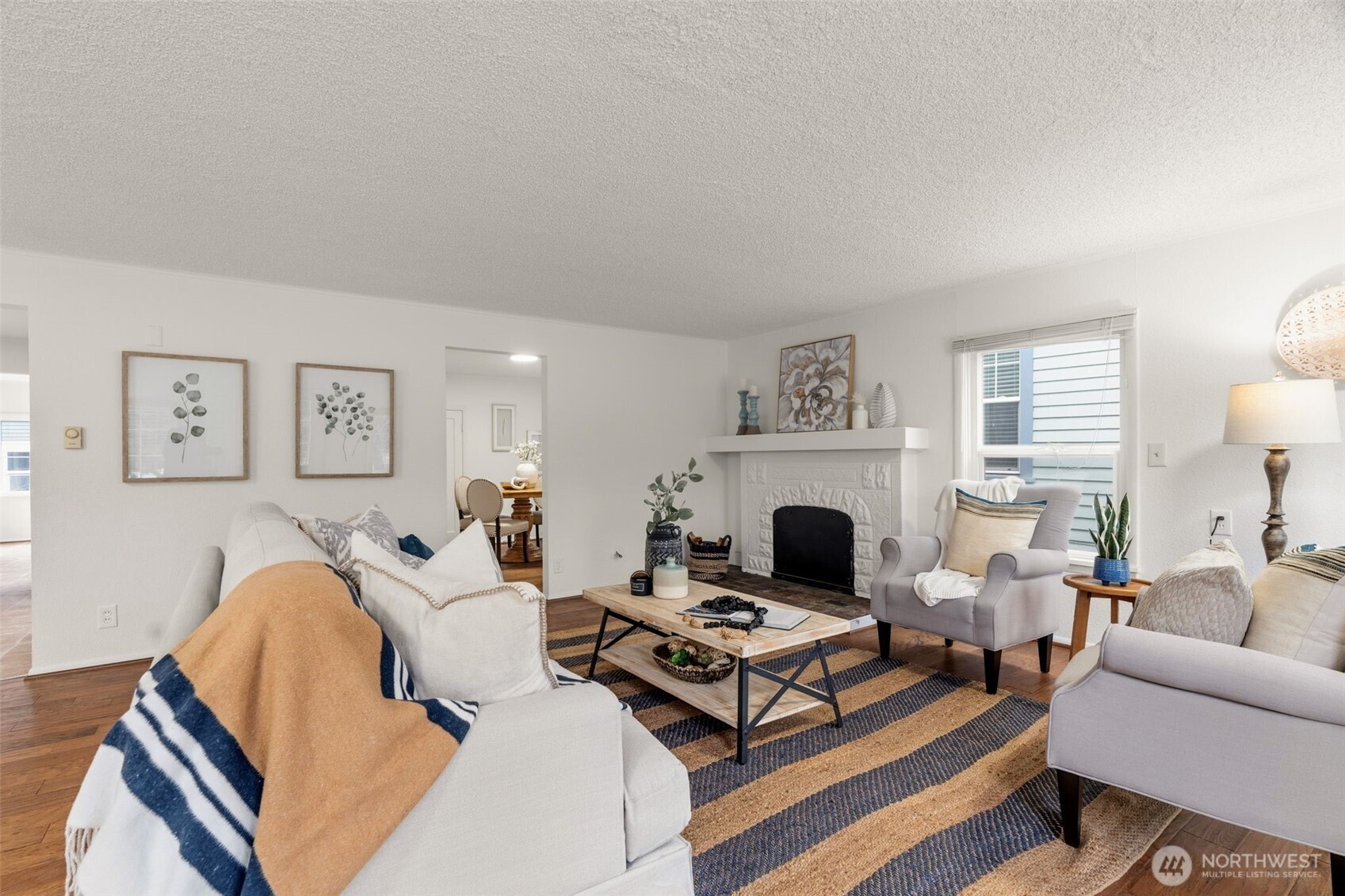 921 North 50th Street Seattle, WA 98103 - Photo 6 of 32 a living room with furniture fireplace and window
