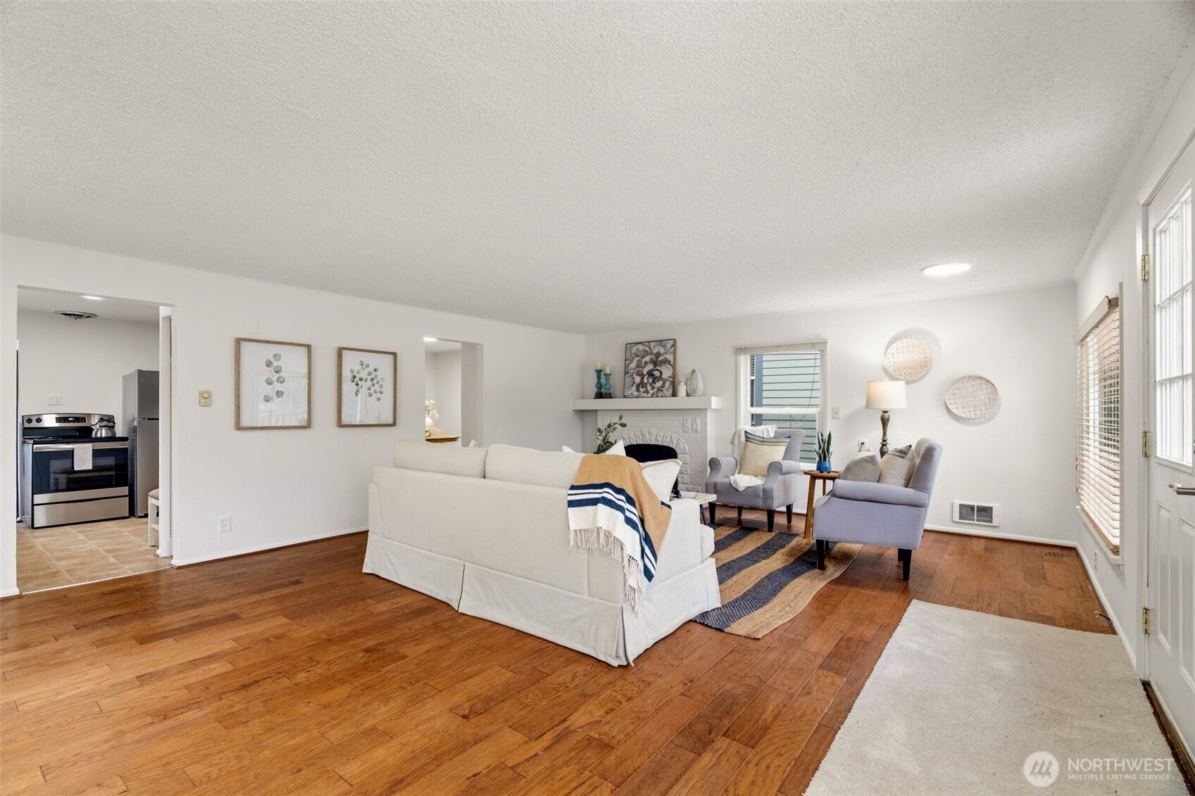 921 North 50th Street Seattle, WA 98103 - Photo 9 of 32 a living room with furniture and a table