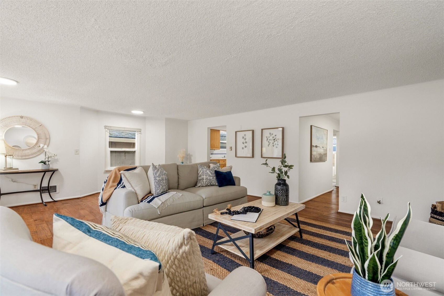 921 North 50th Street Seattle, WA 98103 - Photo 10 of 32 a living room with furniture and a wooden floor