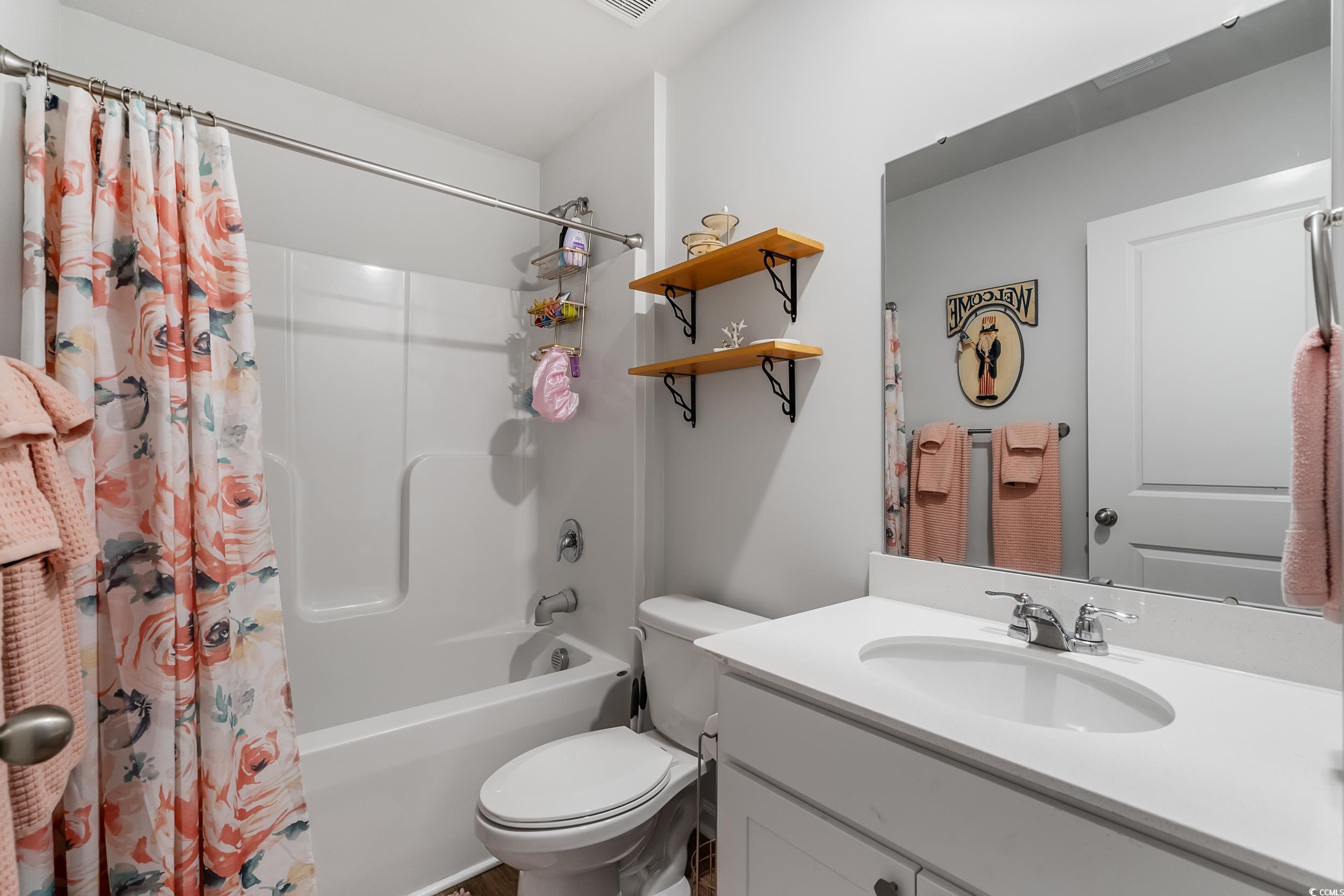 914 Cherrystone Loop Conway, SC 29526 - Photo 31 of 40 Bathroom with visible vents, toilet, shower / bath