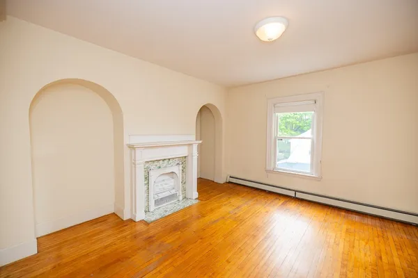 a view of empty room with front door