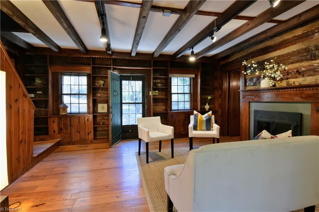 6068 Hedgerow Circle Clemmons, NC 27012 - Photo 4 of 35 Living room with ceiling beams, built-ins and fireplace #1.