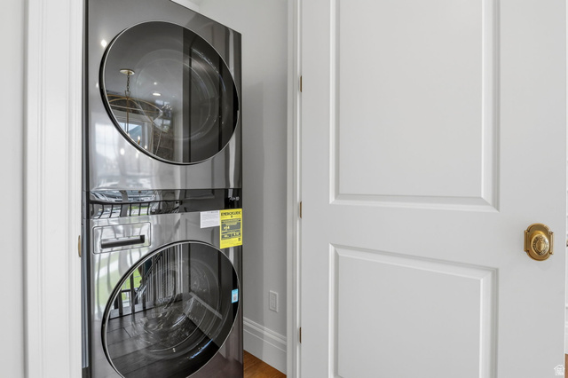 115 East Hidden Ridge Lane, Unit 42 Mapleton, UT 84664 - Photo 47 of 103 Stacked laundry appliances with a dark finish