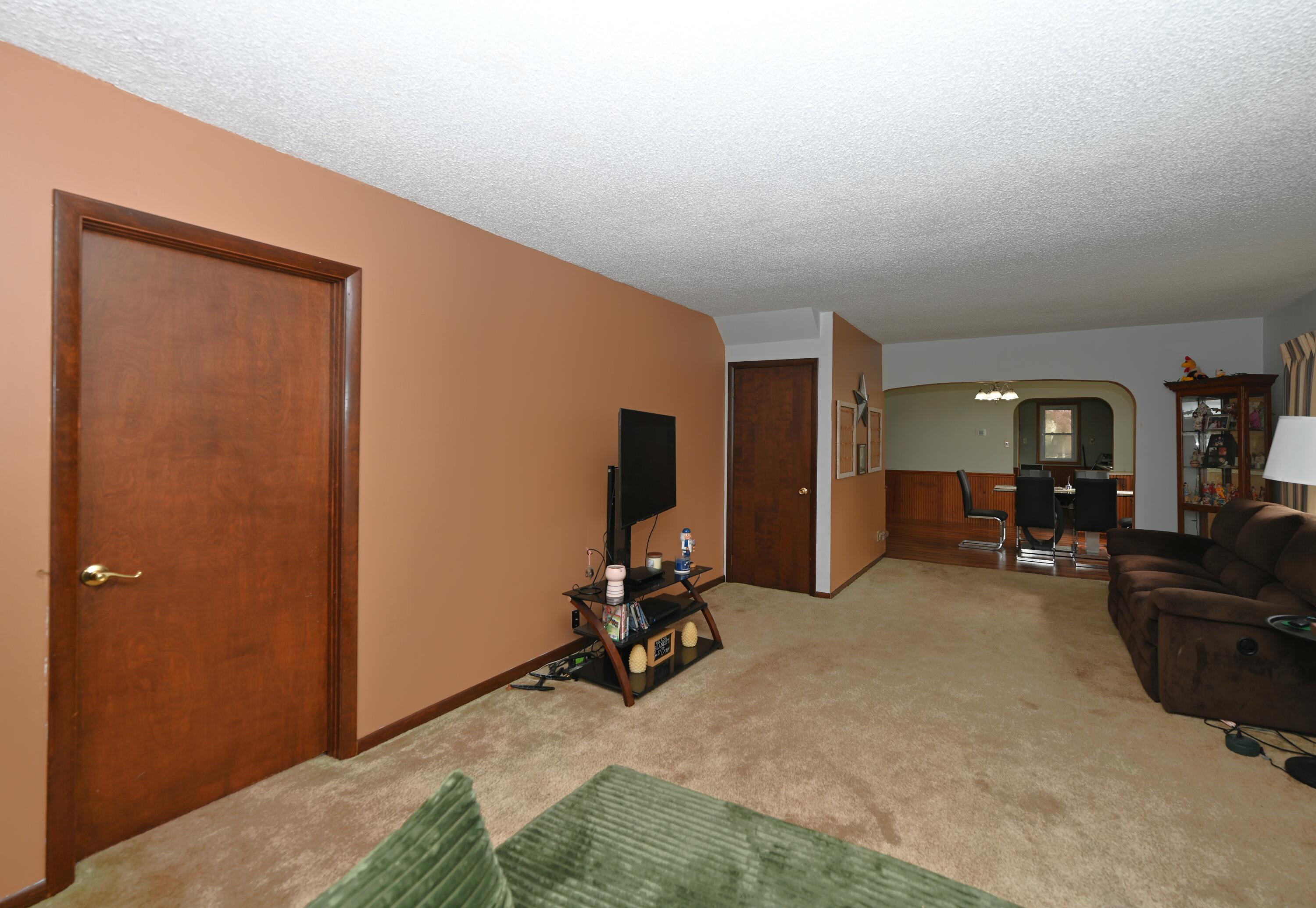 5110 West 400 North Winamac, IN 46996 - Photo 19 of 35 a room with furniture and a flat screen tv