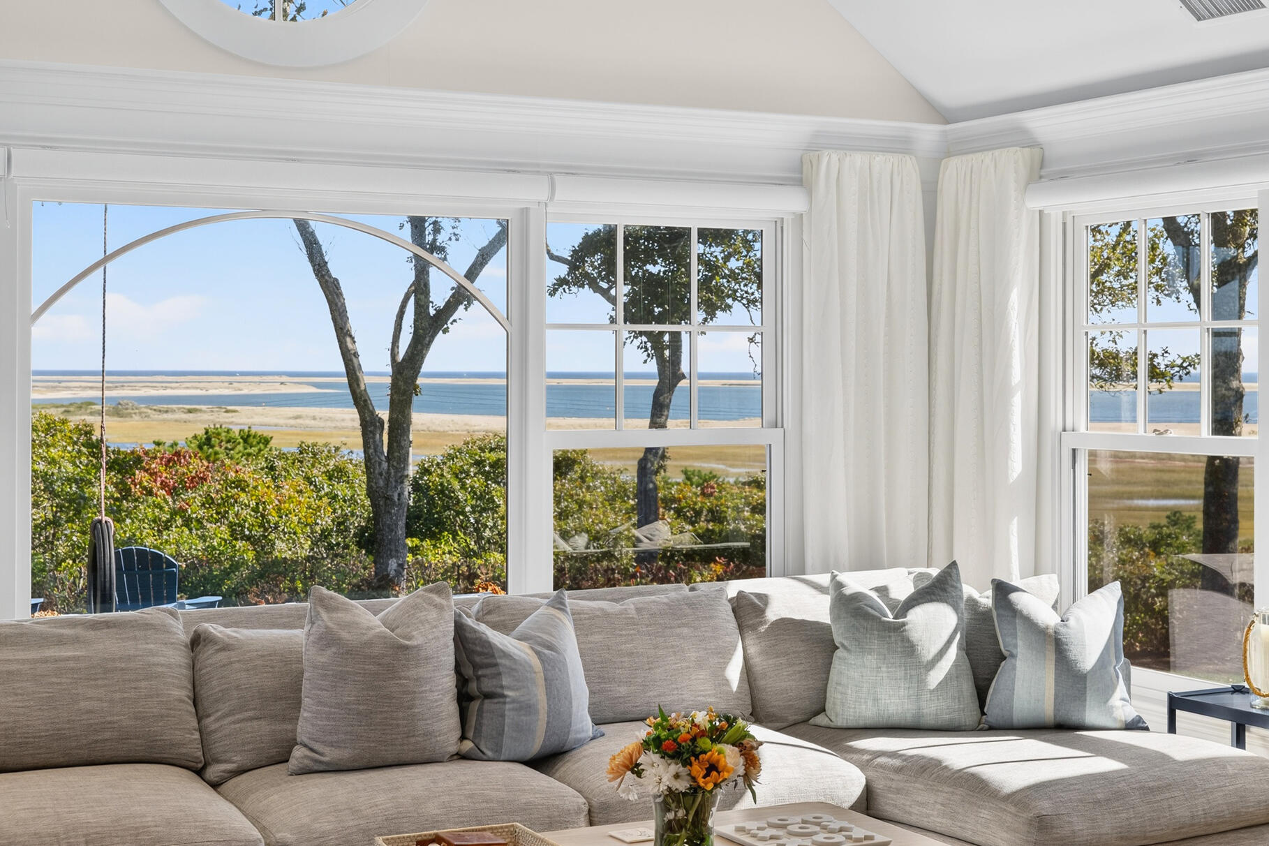 30 Tisquantum Road Chatham, MA 02633 - Photo 15 of 52 a living room with furniture and a large window