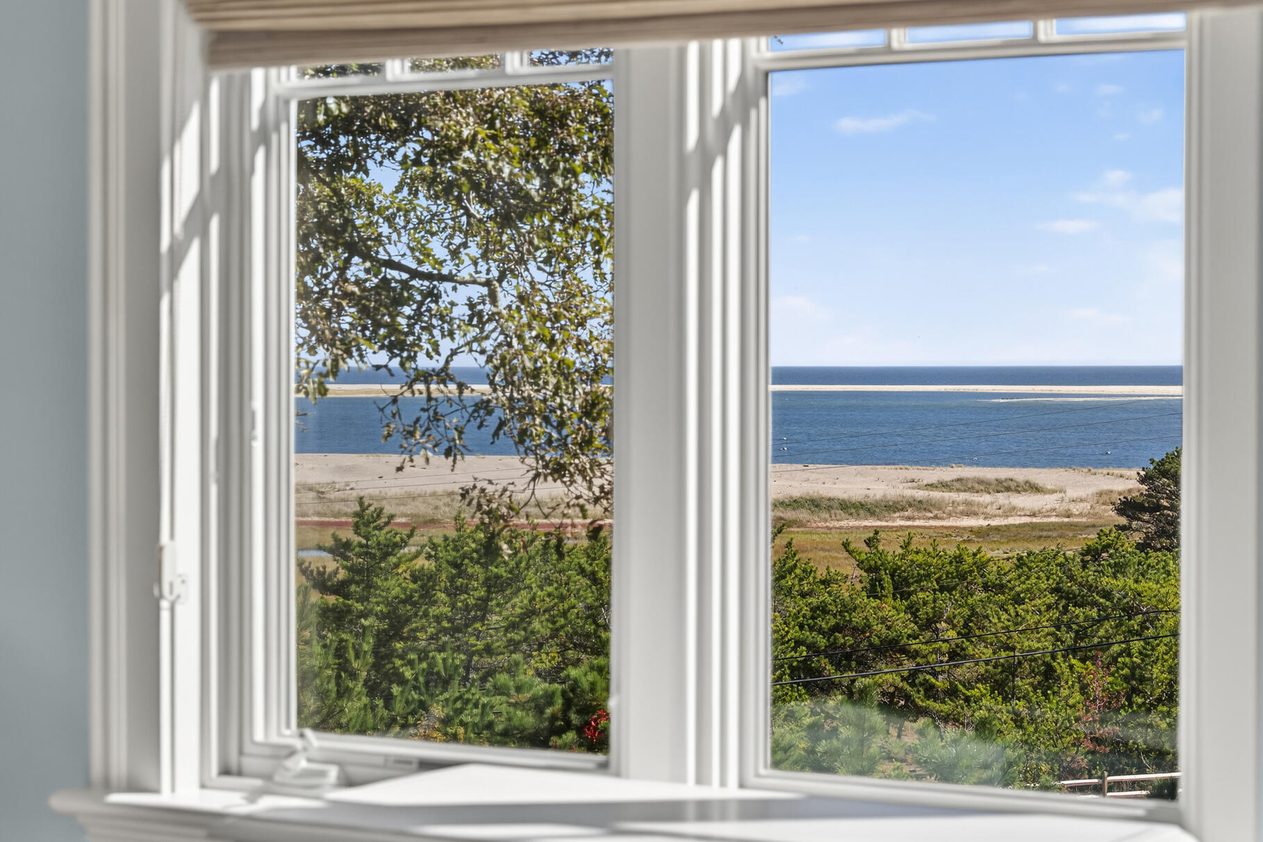 30 Tisquantum Road Chatham, MA 02633 - Photo 43 of 52 a view of a glass door with a yard from a window