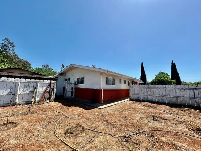 a house view with a outdoor space